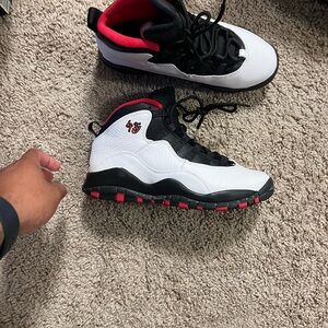 White and Black Sneakers with Red Accents